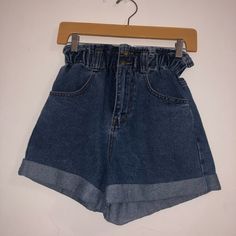 A Pair Of Denim Paper Bag Shorts Featuring An Elasticized Waist, Zip Fly, Front Slant Pockets, Back Patcpocketsh , A Cuffed Hoem. First 2 Pictures Are The Color Of The Denim, Last 3 Pictures Just Show How They Fit. They’re New! Never Worn. Trendy Dark Wash Jean Shorts, Trendy Dark Wash Jean Shorts With Pockets, Dark Wash High-waisted Jean Shorts With Pockets, Trendy High-waisted Dark Wash Jean Shorts, Forever 21 Medium Wash High-waisted Shorts, Trendy Forever 21 Bottoms With Pockets, Casual Dark Wash Jean Shorts For Day Out, Forever 21 High Waist Cotton Jean Shorts, Forever 21 High-waist Jean Shorts With Built-in Shorts