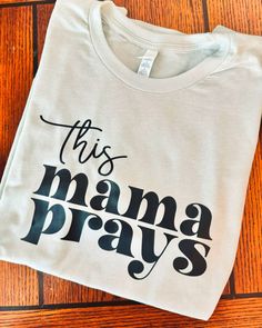 This Mama Prays Shirt, Christian Mom Crewneck, Mom Appreciation Gift, Mothers Day Gift, Mama Life Shirt, Mom Birthday Tshirt Gift, Gift for Christian If you like an oversized comfortable fit, we reccommend choosing 1 or 2 sizes larger than your usual size. Unisex T-shirt fits like a well loved favorite, featuring a crew neck design.  CARE Turn inside out before washing Wash in cold water Air or tumble dry on low Processing is 3-5 Business Days Shipping is 2-5 days after processing time Mom Appreciation Gifts, Pray Shirt, Mom Appreciation, Mom Crewneck, Birthday Tshirts, Shirt Fits, Mom Birthday, Mom Birthday Gift, Christian Shirts