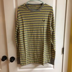 American Eagle Sweater. Size: L. Color: Gray With Yellow Stripes. Condition: Brand New In Package With Tags. Casual Striped Crew Neck Outerwear, American Eagle Sweater, Yellow Stripes, Gray Yellow, Colorful Sweaters, American Eagle Outfitters, American Eagle, Men Sweater, Man Shop