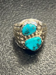 Turquoise ring measures 7/8" tall Southwestern Style Turquoise Inlay Ring, Western Style Blue Turquoise Ring In Sterling Silver, Western Style Blue Turquoise Sterling Silver Ring, Western Style Blue Sterling Silver Ring, Collectible Western Style Turquoise Ring Stamped 925, Western Style Stamped 925 Turquoise Ring, Western Style Turquoise Ring Collectible, Western Silver Turquoise Ring Stamped 925, Western Turquoise Ring With Inlay