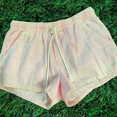 Size Small Pale Pink Bleach Color Draw String Adorable Pair Of Shorts. Never Worn Pink Beach Bottoms With Pockets, Pink Bottoms With Pockets For Beach Season, Pink Shorts With Pockets For Beach Season, Pink Summer Bottoms With Drawstring, Summer Pink Bottoms With Drawstring, Pink Drawstring Bottoms Of Short Length, Pink Drawstring Summer Bottoms, Summer Pink Drawstring Bottoms, Casual Pink Short Pants