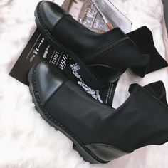 Harajuku Chunky Black and White Short Combat Boots ✔️ Material: Nylon, EVA Sole ✔️ Fits true to Size Please refer to Size Chart below before ordering. SIZE INFO NOTE: DUE TO VERY HIGH DEMAND, PLEASE ALLOW 12-20 DAYS FOR DELIVERY TO THE US, AND 20-45 DAYS TO THE REST OF THE WORLD. Black Martin Boots With Thick Bottom For Fall, Black Thick Bottom Martin Boots For Fall, Fall Streetwear Martin Boots With Pointed Toe, Black Fitted Martin Boots With Round Toe, Fitted Black Martin Boots With Round Toe, Winter Flat Heel Martin Boots For Streetwear, Winter Streetwear Martin Boots With Flat Heel, Flat Heel Martin Boots For Winter Streetwear, Black Synthetic Martin Boots For Fall