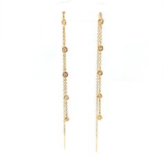 These threaders feature five bezel set diamonds on 14k yellow gold chain. Elegant, modern & perfect for any occasion! 14k yellow gold .12ctw Sold as a pair Yellow Gold Bezel-set Dangle Diamond Earrings, Gold Dangle Diamond Earrings With Bezel Setting, Gold Linear Earrings With Single Cut Diamonds, Yellow Gold Dangle Jewelry With Bezel Setting, Gold Dangle Earrings With Bezel Setting, Gold Bezel-set Dangle Earrings, Bezel Set Diamond, Yellow Gold Chain, Threader Earrings