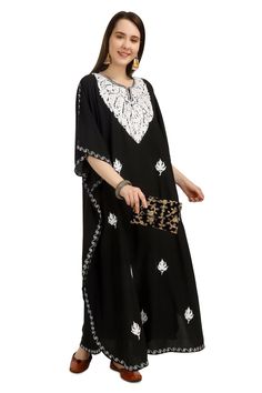 Kashmiri Aari Embroidered Cotton Kaftan.A Stunningly Marvellous Kaftan.This Kaftan Is Made Of Cotton Its Embroidered  With White Colour.Breezy Cotton Bohemian Maxi Dresses Or Caftans Are The Perfect Style Statement For Summer, Spring Days, Beach Holidays.The Embroidery Done On This Is A Traditional Kashmiri Embroidery Known As 'Aari Work''. Product Details - Condition: Brand New - Handmade - Style: Kaftan - Fabric: soft Cotton - Embroidery: Kashmiri Aari Embroidery - Length: 54'' Inch - Chest: 6 Semi-stitched Embroidered Georgette Dress, Navratri Embroidered Straight Kurta Dress, Traditional Chikankari Embroidered Maxi Dress For Eid, Traditional Chikankari Embroidery Maxi Dress For Eid, Anarkali Style Embroidered Straight Kurta Maxi Dress, Traditional Eid Maxi Dress With Chikankari Embroidery, Anarkali Maxi Dress With Embroidery, Semi-stitched Floral Embroidered Dress For Navratri, Semi-stitched Floral Embroidery Dresses For Navratri