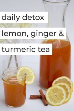 a pitcher of lemon, ginger and turmeric tea next to some cinnamon sticks