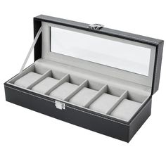 an open black leather watch box with six watches in it's lid and two separate compartments