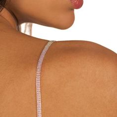 silver bra straps on medium skin