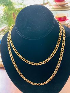 This gorgeous 35" long Nina Ricci gold tone chain is in the excellent condition. Yellow Gold Necklace With Chain Strap For Party, Gold-tone Adjustable Chain Necklace For Evening, Evening Gold-tone Adjustable Chain Necklace, Gold-tone Long Necklace For Formal Occasions, Yellow Gold Long Necklace With Adjustable Chain, Formal Long Gold Chain Necklace, Gold Lariat Long Necklace, Evening Yellow Gold Adjustable Chain Necklace, Yellow Gold Jewelry With Chain Strap For Evening