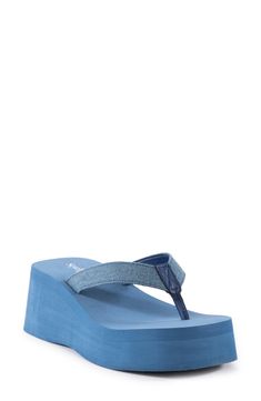 Wide straps and a cushioned footbed bring breezy comfort to this on-trend flip-flop set on a chunky platform. 2 1/4" heel; 1 1/2" platform Textile or synthetic upper/synthetic lining and sole Imported Comfortable Blue Synthetic Wedge Sandals, Spring Pool Sandals With Synthetic Material, Casual Blue Platform Slippers For Summer, Synthetic Toe Post Platform Slippers With Textured Footbed, Blue Synthetic Platform Slippers For Summer, Summer Synthetic Platform Slippers With Arch Support, Synthetic Summer Platform Slippers With Arch Support, Platform Toe Post Synthetic Flip Flops, Summer Foam Flip Flops With Round Toe