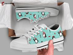 Introducing our adorable Kawaii Penguin Low Top Shoes, the perfect gift for both men and women who appreciate style with a touch of cuteness. These shoes are meticulously crafted to bring joy to your everyday life, while ensuring utmost comfort and durability. Featuring a charming penguin design, these shoes are bound to turn heads wherever [...] Fox Shoes, Low Top Converse, Style Converse, Personalized Shoes, Converse Style, Low Top Shoes, Shoes Custom, Younger Sister, Shoe Gifts