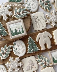 decorated cookies are displayed on a table