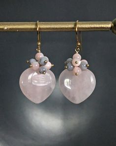 Rose Quartz and Mother of Pearl Heart Dangle 24 K Gold Filled Earrings, Jewelry Gift, Teeny Pinck Quartz Mother of Pearl Heart Earrings. They are about 1,6'' ( 41 mm.) long. * Processing time is 3 - 5 days.  * US orders are shipped first class mail. * International orders are shipped first class international. * Shipping upgrades are available at checkout. Thank you for visiting my listing! Have a wonderful day! Handmade Teardrop Heart Earrings For Valentine's Day, Handmade Heart Teardrop Earrings For Valentine's Day, Heart-shaped Dangle Earrings For Valentine's Day, Anniversary Heart Beads Dangle Earrings, Pearl Heart Earrings, Purple Dangle Earrings, Diy Jewelry Making Tutorials, Pearl Earring Set, Gold Heart Earring