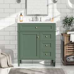 a bathroom with a green cabinet and sink in the center, white tile on the walls