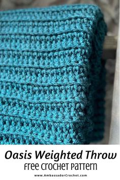 a blue crocheted blanket with the text oasis weighted throw free crochet pattern