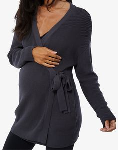 Founded in 2001 by Ingrid Carney when she was pregnant with her daughter Isabel, this maternity brand offers supercool styles for every step of the journey from pregnancy through motherhood. Meet the cozy cardigan that you may or may not live in—don't worry, we won't tell(!) Wear it with your favorite basics & tie an entire outfit together. The functional wrap silhouette adjusts to your growing bump (& who doesn't love pockets). Plus, we love pairing it with a nursing cami for easy Nursing Sweater, Maternity Jacket, Longline Sweater, Maternity Brands, Pregnancy Outfits, Cozy Cardigan, Womens Maternity, Maternity Nursing