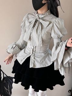 Crafted with meticulous attention to detail, this shirt features enchanting bell sleeves adorned with intricate lace-up designs on both the sleeves and back, adding a touch of romantic elegance. Included with this stunning shirt are a matching necktie and a decorative bib, enhancing its versatility and charm.   	 		 			Size 			S 			M 			L 			XL 		 		 			Full Length 			57 			58 			59 			60 		 		 			Bust 			86 			90 			96 			102 		 		 			Shoulders 			31 			32 			33 			34 		 		 			Sleeve Length Fairycore Dress, Fairycore Clothes, Dark Academia Clothes, Academia Clothes, Cottagecore Outfits, Blue Striped Shirt, Kawaii Dress, Lolita Dress, Art Studies