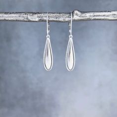 "✦These minimalist style earrings are perfect for everyday wear.  Simple 925 sterling silver teardrop dangles hang from sturdy sterling silver leverback ear wires. The teardrops made of formed sterling silver with a patterned edge and are convex and scooped out on the backside so they are lightweight. ✦The teardrops have a slim design, measuring 6mm wide by 24mm long.  The earring length is about 1.6 inches, from the top of the ear wire to the bottom of the teardrop.   ✦Available with sterling silver leverback or French hook ear wires. Please select ear wire style at check out. ✦Click here to see my collection of sterling silver teardrop earrings https://www.etsy.com/shop/WendyShrayDesigns?ref=seller-platform-mcnav&search_query=e582 ✦Your jewelry will be packaged in a beautiful and reusabl Diy Jewelry Projects, Leverback Earrings, Jewelry Card, Style Earrings, Jewelry Projects, Slim Design, Ear Wire, Minimalist Style, Teardrop Earrings