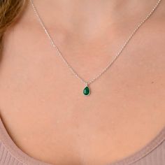 This dainty emerald green teardrop pendant necklace has a delicate silver chain. The chain is solid sterling silver 925., and there is an extension so that the size can be adjusted. There are different stonees to choose from. The stones are natural stones and no 2 are identical, but they are similar. If you would like a custom order or have any questions please contact me, thanks. Silver Necklace Green Stone, Sterling Silver Emerald Necklace, Green Teardrop Jewelry With Delicate Chain, Teardrop Emerald Necklace In Sterling Silver, Green Teardrop Necklace For May Birthstone, Dainty Emerald Birthstone Necklace In Sterling Silver, Dainty Sterling Silver Emerald Birthstone Necklace, Sterling Silver Charm Necklace With May Birthstone, Green Sterling Silver Charm Necklace For May Birthstone