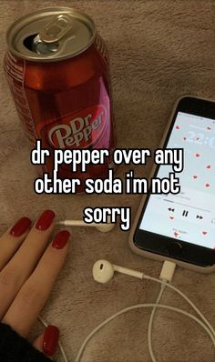 a woman's hand next to a can of soda and headphones with the caption dr pepper over any other soda i'm not sorry