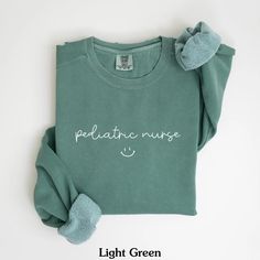 Pediatric Nurse Sweatshirt, PEDS Nurse Crewneck, Peds Nurse Shirt, Picu Nurse Sweatshirt, Pediatric RN Sweatshirt, Comfort Colors® ------------------------------------------------------------------------------------------------- SWEATSHIRT INFO COMFORT COLORS 1566 Unisex Garment-Dyed Sweatshirt Luxurious comfort and style are what this unisex, garment-dyed sweatshirt is all about. It's made with 80% ring-spun cotton and 20% polyester and the fabric is 3-end garment-dyed, ring-spun, color-blast f Sweater Details, Nurse Appreciation Gifts, Nurse Sweatshirt, Tech Shirt, Intensive Care Unit, Nursing Shirts, Nurse Gifts, Heavy Fabric, Favorite Things Gift