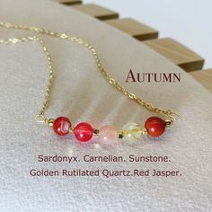 All necklaces are handmade and designed by us. In our store you will find high quality jewelry and in a reasonable price. -Jewelry Description- This set of jewelry s made up of Red Jasper, Golden Rutilated Quartz, Sardonyx, Carnelian and Sunstone. It would be a gift for those who love autumn season and colors. "Autumn leaves don't fall, they fly. They take their time and wander on this their only chance to soar."-Delia Owens All crystal beads in our store are natural and in high grade. -Material Red Crystal Necklace With Natural Stones, Red Crystal Necklaces With Gemstone Beads For Gift, Amber Round Beads Crystal Necklace For Gift, Red Agate Gemstone Necklace, Red Agate Crystal Necklace For Healing, Red Crystal Gemstone Necklace For Gifts, Red Crystal Necklace With Gemstone For Gift, Red Crystal Necklace With Natural Stones For Gift, Amber Polished Beads Necklace For Gifts