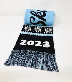 "After making your purchase on Etsy, simply go to https://www.pixelknit.com/etsyscarf to customize your design.  If you choose \"Design it for me\" you do not need to follow the link.  Just make sure to include the text and colors you would like us to use.  We will send you a mockup to approve. Your scarf is knit and finished in our studio. Designs are not printed or embroidered; we knit your design into the scarf.  We have chosen yarn that is soft & very comfortable, yet durable & machine washa Soccer Scarf, Football Scarf, Logo Football, Wedding Scarf, Combination Fashion, Great Anniversary Gifts, Logo Scarves, Acrylic Fiber, Text Logo