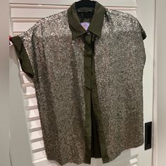 Beautiful Metal Sequins Blouse. Olive Green 100% Silk. Beautiful Fit. Weighs A Bit Considering Sequins Are Metal. Size Is Small But I’m An 8/10 And Has A Nice Fitted Fit, So Would Be A Loser Fit For A Size Small Frame. Sequin Button-up Blouse For Night Out, Short Sleeve Party Tops With Buttons, Elegant Sequined Button-up Blouse, Elegant Button-up Sequin Blouse, Elegant Button-up Blouse With Sequins, Short Sleeve Party Shirt With Buttons, Party Shirt With Short Sleeves And Buttons, Party Blouse With Button Closure And Short Sleeves, Green Button-up Blouse For Night Out