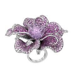 This unique piece can be worn three ways, as a ring, pendant and brooch. The ring shank slides on and off the bottom to easily change from ring to brooch and back. It features 4.06 carats of diamond, 16.17 carats of pink and purple sapphire, and a 26.25 carat amethyst in the center. Made in 18K white gold. Engagement Ring Nails, Ring Nails, Gold Flower Ring, Amethyst Gold, Purple Sapphire, Sapphire Diamond Ring, Amethyst Jewelry, Ring Pendant, Gold Flower