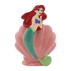 the little mermaid figurine is on display