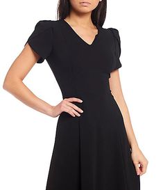 Women's Dresses & Gowns | Dillard's Formal Short Sleeve Stretch Mini Dress, Formal Stretch Mini Dress With Short Sleeves, Lined Stretch Mini Dress For Work, Stretch Lined Mini Dress For Work, Calvin Klein A-line Formal Dresses, Spring V-neck Flattering Bodycon Dress, Spring V-neck Flattering Silhouette Bodycon Dress, Flattering Knee-length Mini Dress For Work, Spring V-neck Bodycon Dress With Flattering Silhouette