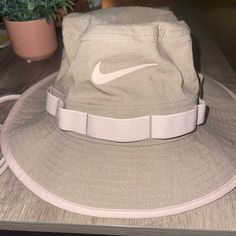 Nike Bucket Hat! Excellent Condition, Never Worn Outdoors. No Marks Whatsoever. Basically Brand New Without Tags! Beige Color Way. Nike Korea Hat, Cream Nike Hat, Beige Nike Hat, Nike Cap Beige, Nike Bucket Hats, Nike Adjustable Spring Hats, Nike Summer Cap, Casual Nike Flat Brim Hat, Nike Adjustable Hats For Outdoor