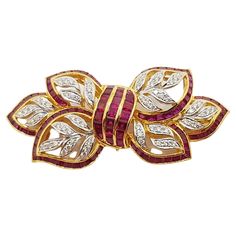 Ruby 3.78 carats with Diamond 0.41 carats Brooch set in 18 Karat Gold Settings Width: 4.6 cm Length: 2.2 cm Total Weight: 11.03 grams "We first opened doors in 1980 when it was then situated in the vicinity of the Victory Monument; a small and modest storefront with a couple of counters. From its humble beginnings to where it stands today, our company has proven its abilities as a jeweler. Since the beginning, we have been supplying fine quality pieces to dealers, wholesalers and customers worldwide. From then till now, our business still interrelates its name with quality products and excellent service, where commitment and sincerity toward customers will always be its motto." Humble Beginnings, Bow Jewelry, Diamond Brooch, Gold Brooches, Fine Jewelry Designers, Stone Design, Gold Pearl, Silver Heart, Ribbon Bows