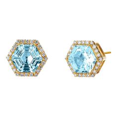 Created in 18 karat yellow gold  Blue topaz 3 carats approx.  Diamonds 0.20 carat approx.  Post backs for pierced ears  Limited Edition    Crafted from 18 karat yellow gold, these luxurious earrings boast an exquisite blue topaz of approximately three carats and are framed with dazzling diamonds of around 0.20 carats. Adorned with post backs to secure pierced ears, these limited-edition pieces radiate glamour and sophistication.    About the Designers    Drawing inspiration from little things, Dharmesh & Namrata Kothari have created an extraordinary and refreshing collection of luxurious jewels. True believers of destiny, they always feel that the possibilities of design - and life - are limitless when people work together. Formed in 2003, Syna Jewels has grown through enduring relationshi Formal Blue Topaz Diamond Earrings Fine Jewelry, Formal Blue Topaz Diamond Earrings, Luxury Yellow Gold Topaz Earrings, Formal Yellow Gold Topaz Earrings, Yellow Gold Earrings With Blue Topaz And Gemstone Accents, Yellow Gold Earrings With Blue Topaz Gemstone, Yellow Gold Jewelry With Diamond Accents And Blue Topaz, Luxury Blue Topaz Earrings With Prong Setting, Yellow Gold Blue Topaz Jewelry With Diamond Accents