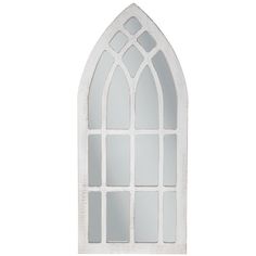 an arched window with white paint on the outside and inside, is shown against a white background