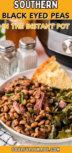 a white plate topped with beans and greens