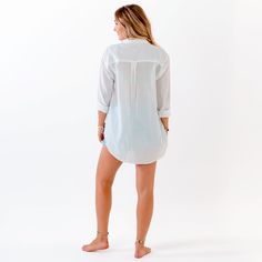 Never sacrifice style for comfort again! Rock our Boyfriend Button Up all around town, from the beach to the street. Crafted with breathable 100% cotton and natural coconut shell buttons, this lightweight long sleeve top has an oversized fit. Throw on as a swim cover-up after a quick dip in the ocean or styled with jeans for brunch with the gals. Note: The black and white styles boast a lightweight 1-ply cotton for coverage, while the new sage color rocks a thicker 2-ply cotton, ensuring the coz Relaxed Fit Long Sleeve Top For Beach Cover-up, Lightweight Long Sleeve Beachwear Cover-up, Relaxed Fit Long Sleeve Beachwear Blouse, Beachwear Long Sleeve Relaxed Fit Blouse, Long Sleeve Beachwear Blouse With Relaxed Fit, Relaxed Fit Long Sleeve Cover-up For Vacation, Oversized Cotton Casual Cover-up, Relaxed Long Sleeve Tops For Summer, Beachwear Button-up Blouse For Vacation