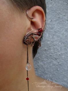 A pair of ear cuffs made of copper wire, chains and glass Czech beads. These ear wraps are worn behing your ear like a Blue Tooth device and no piercing is needed.  They are easy to adjust to the size of ear more perfectly by just slowly pulling down (or squeezing) the lower part of the ear cuff, this pair is adjustable for ear sized 2.1 - 2.7 inches (5.3 - 6.6 cm) . For ear cuff of smaler or bigger size convo me, Ill be happy to make a pair specially for you. the ear cuffs come in a gift box... Unique Adjustable Pierced Ear Climbers, Adjustable Unique Style Ear Climbers, Metal Ear Cuff As A Gift, Pierced Metal Ear Cuff With Unique Style, Unique Adjustable Pierced Ear Cuff, Unique Metal Ear Climbers With Ear Wire, Handmade Adjustable Ear Climbers, Unique Handmade Metal Ear Cuff, Unique Ear Climbers As Gift