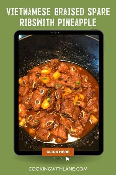 a plate filled with meat and vegetables on top of a stove