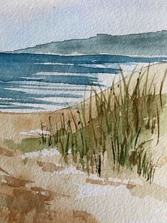 watercolor painting of grass on the beach