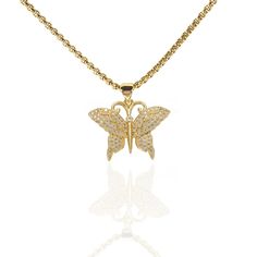 This Art Deco inspired butterfly pendant has a long lasting 18k gold plating over brass with micro pave set cubic zirconia. The chain is a Venetian style with a lobster clasp. Choose your length. Both pendant and chain have a long lasting gold plating. The pendant size is 23x28x2.5mm. You can also buy the pendant alone, without a chain. Comes in a very lovely plain velvet draw string gift bag. Makes an excellent gift, or a great addition to a personal jewellery collection! ---------------------- Gold Butterfly Chain Jewelry, Gold Cubic Zirconia Butterfly Necklace With Clavicle Chain, Gold Butterfly Pendant Necklace In Cubic Zirconia, Gold Cubic Zirconia Butterfly Pendant Necklace, Gold Cubic Zirconia Butterfly Necklace, Butterfly Pendant Necklace, Art Deco Inspired, Butterfly Pendant, Jewellery Collection