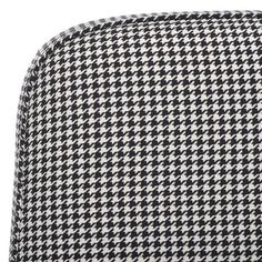 the black and white houndskin pattern on this suit