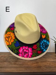 Medium Size Our hats are stylish and is completely unique in design, perfect to add that special touch to any outfit. Multicolor Flat Brim Panama Hat, Summer Embroidered Short Brim Hat, Embroidered Summer Hat With Short Brim, Multicolor Spring Visor Hat, Summer Embroidered Visor Hat, Embroidered Summer Visor Hat, Embroidered Short Brim Beach Hat, Embroidered Visor Hats For Summer, Embroidered Flat Brim Summer Hat