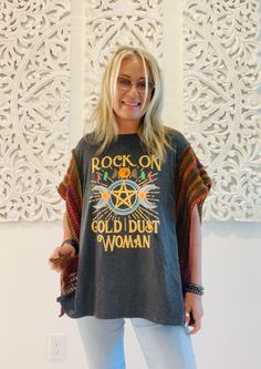 Welcome to LM Handmade Boutique! Limited Edition**  Rock on Gold Dust Woman- T Shirt Poncho Perfect in any season, more than just fashion--wearable art.  This unique upcycled crochet t-shirt poncho is the perfect blend of comfort and boho chic style. Handcrafted with care, I've taken this cool t-shirt and combined it with intricate crochet detailing, creating a versatile and comfortable piece that is truly one-of-a-kind. Designed to be loose and flowy, this poncho is a lightweight layer you can Rock On Gold Dust Woman, Upcycled Crochet, Boho Hippie Fashion, Gold Dust Woman, Crochet T Shirt, Festival Poncho, Wearable Art Fashion, Intricate Crochet, Hippie Fashion