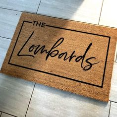 a door mat with the words the longboards written in cursive font on it