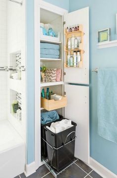 the bathroom is clean and ready to be used as a storage area for towels, toiletries and other items