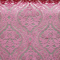 pink and grey fabric with an intricate design