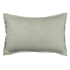 a light green pillow on a white background