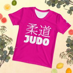 a t - shirt with the word oud written in chinese on it next to some fruit