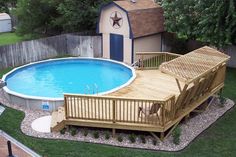 an above ground swimming pool with deck and gazebo