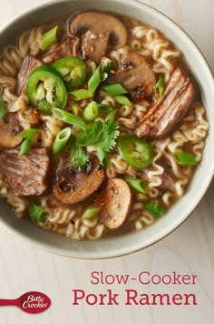 a bowl of soup with noodles, mushrooms and green peppers on the side that says slow - cooker pork ramen